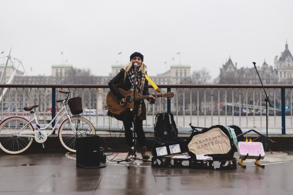 A Woman Busking In England